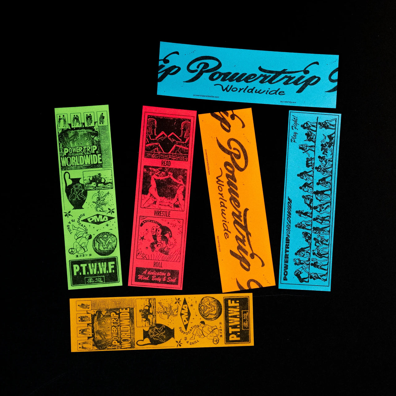 Multiple paper bookmark designs in varied colors by Powertrip© Worldwide.