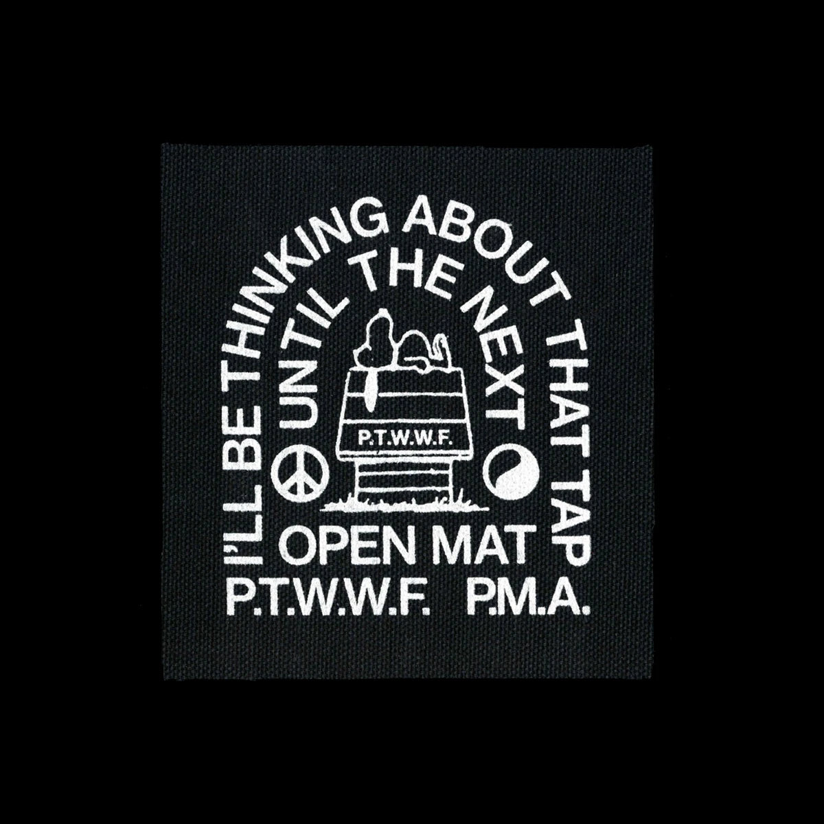 White canvas patch. Cartoon dog on doghouse. Text reads "I'll be thinking about that tap until the next open mat. P.T.W.W.F. P.M.A."